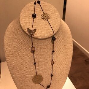 Delicate necklace with charms
